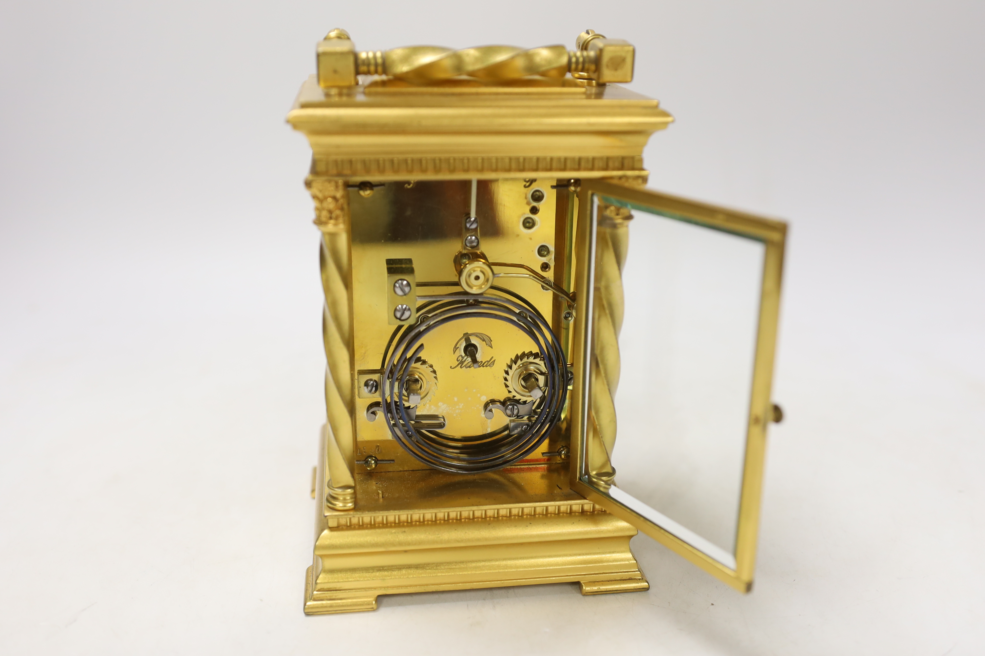 A large early 20th century French gilt metal repeating carriage clock, 17cm, with key